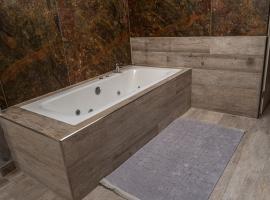 Buddha Hotel Zuchwil, hotel con bañera de hidromasaje en Zuchwil
