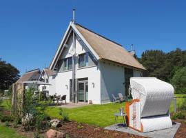 Fischerhus Loddin mit Sauna und Kamin, hotel en Loddin