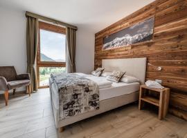 Villetta Val Di Sole, aparthotel in Commezzadura