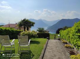 CasaDolcelago Sulzano Villa con Giardino Vista Lago Parking Free, hotel in Sulzano