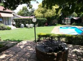 Roosboompies Guest Suite, hotel con vasche idromassaggio a Centurion