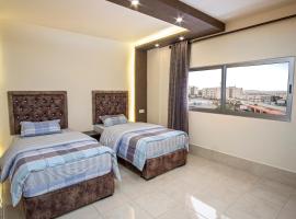 Al Riyati Hotel Apartments, ξενοδοχείο στην Άκαμπα