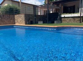 Casa con piscina en la Costa Brava, casa de férias em Calonge