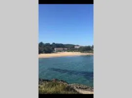 Duplex a pie de playa con piscina y tenis