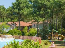 Maisonnette mitoyenne 2 étoiles paisible piscine océan lac vélo marche idéal pour tous, hotell i Lacanau-Océan