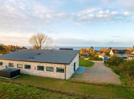 12 person holiday home in Alling bro, overnachting in Allingåbro