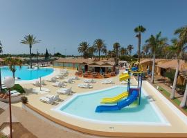 Bungalows Parque Bali con AIRE ACONDICIONADO, Ferienwohnung mit Hotelservice in Maspalomas