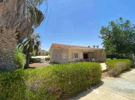 A cheerful chalet villa few steps to the beachside