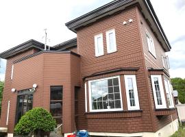 Chitose Guest House Oukaen, hotell i Chitose