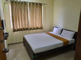 Royal Suvarna Comforts, hotel a Mysore
