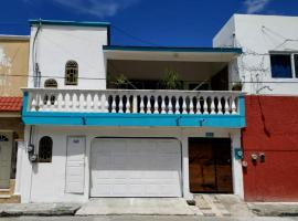 Casa Cálido Hotel, heimagisting í Cozumel