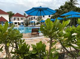 Visitor's Inn, מלון בגאמביאני