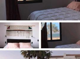 Departamento frente al mar 3 habitaciones 2 baños，科金博的飯店