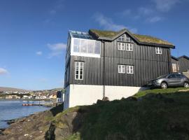Tórhús，Miðvágur的海濱度假屋