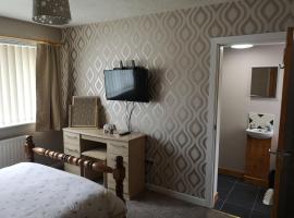 En-suite Bedroom in a quiet bungalow, homestay in Porthmadog