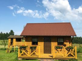 Drewniany domek na wsi, chata v prírode v destinácii Nowa Karczma