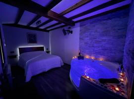 La Era de Lario habitación con Jacuzzi, ξενοδοχείο σε Lario