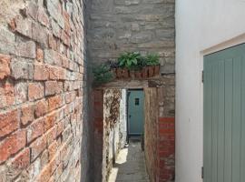 Delighful self catering in the heart of Glastonbury, готель у місті Гластонбері