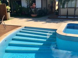 Village charmoso em Itacimirim, hotel with pools in Camacari