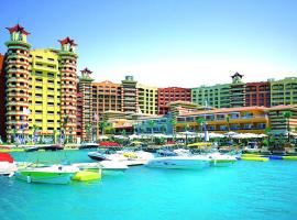 Porto Marina Resort Chalets Families Only: El-Alameyn şehrinde bir otel