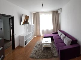 Cozy Apartment Bucharest, hôtel à Roşu