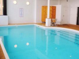 Apartment with Swimming Pool, family hotel in Tenby