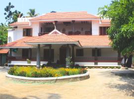 Shore Beach Homestay, hotell i nærheten av Chammanad Devi-tempelet i Turavūr