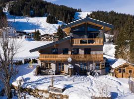 Ski in - Ski out Panoramaferienhaus Breitmoos neben Mittelstation, hótel í Mittersill