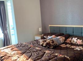 ROOM IN Cozy Grand Kamala Lagoon, hotel en Pekayon Satu