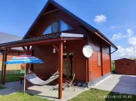 Przytulny domek, hotel v destinaci Darłówko