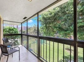 Charming condo with two pools and steps to beach