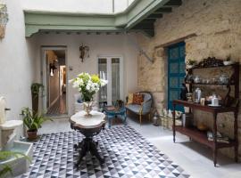 Casa Portus Gaditanus s XVIII Patio Andaluz, allotjament vacacional a El Puerto de Santa María