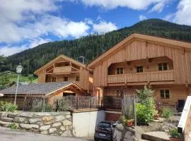 Schlosswirt Chalets & Apartments