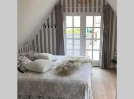 Penthouselejlighed med havneudsigt