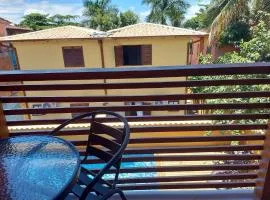 Cotia - Novo Flat com Piscina, 50mts da praia, churrasqueira privativa, ar con, wi-fi, netflix, garagem