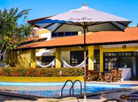 Sunshine Hotel Cumbuco، فندق في كومبوكو