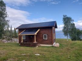 Villmarksgård, hytte ved vannet, pet-friendly hotel in Hattfjelldal