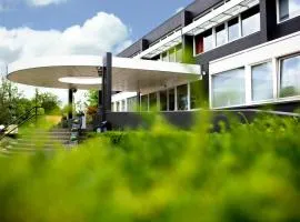 Amrâth Airport Hotel Rotterdam、ロッテルダムにあるロッテルダム空港（ザ・ハーグ空港） - RTMの周辺ホテル