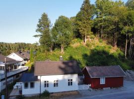 Huset ved evja, hotel con estacionamiento en Ulefoss