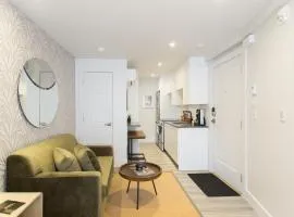 Serene and Styled Little Italy Studio full bath by Den Stays
