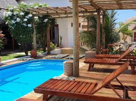 Villa Pousada 35knots Brasil, hotel amb piscina a Ponta do Anel