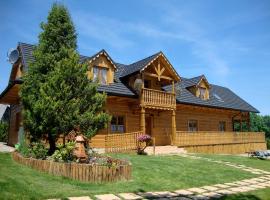 Paradiso Resort domki pokoje mala Italia، فندق في Ropa