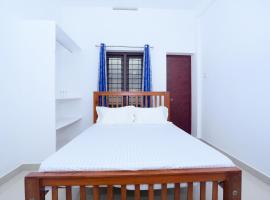 SPOT ON 47468 Jeevan Tourist Home, Hotel in Kizhake Chālakudi