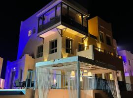 شاليهات ويف -Wave Resort, cabaña o casa de campo en Al Khobar