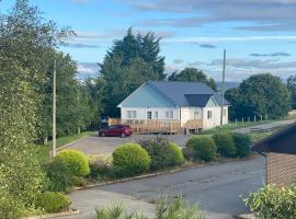 Linne Lodge, hotel con estacionamiento en Tain