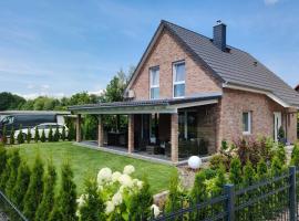 Leaf&Stay Ferienhaus auf Usedom mit optionaler Wallbox, hotel in Paske