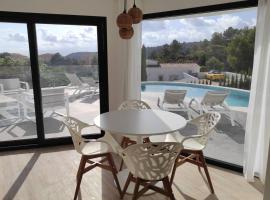 Precioso apartamento en una villa con piscina en Cumbre del Sol Moraira Benitachell, apartment in Cumbre del Sol