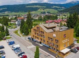 Hotel Dolomiten, отель в городе Доббиако