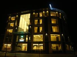 Woodies Bleisure Hotel, hôtel à Kozhikode près de : Aéroport international de Calicut - CCJ