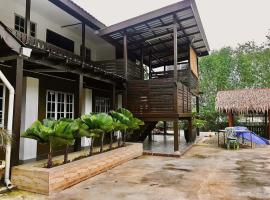 Dinie Inn, hotel v destinaci Hutan Melintang